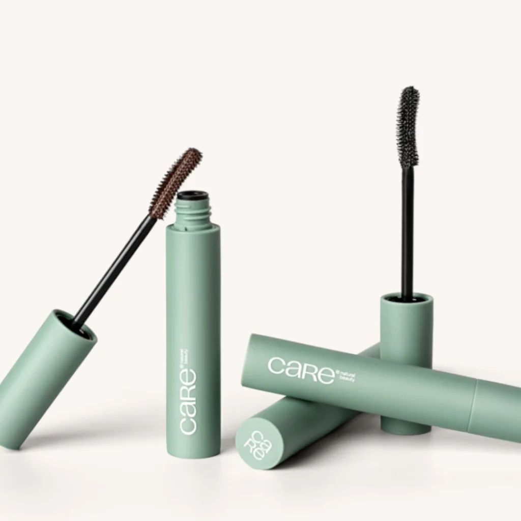 Máscara Tubing Ultimate Length CARE Natural Beauty nas versões Black e Brown, com tecnologia tubing para alongamento e definição dos cílios